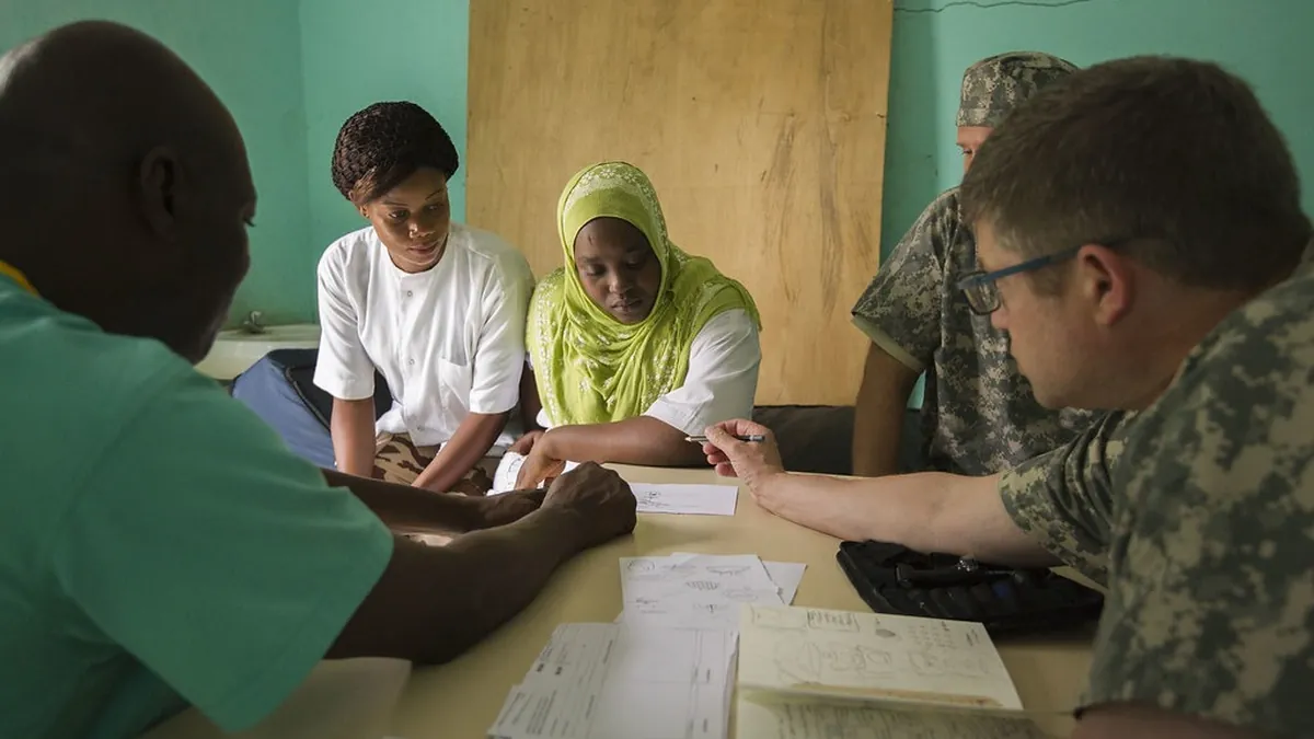 Doctor explaining a cancer diagnosis honestly to a patient and family