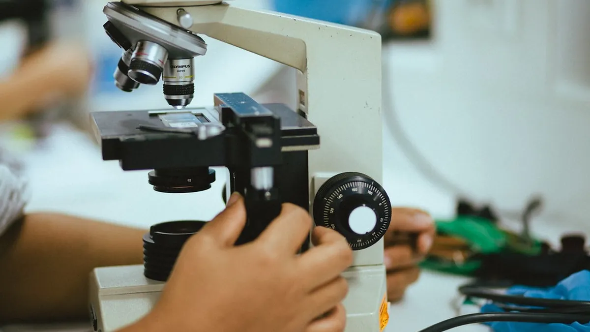 Microscope used by pathologists to examine tissue removed during cancer surgery