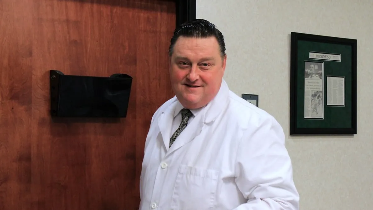 Doctor reviewing medical documents for a pancreatic cancer second opinion